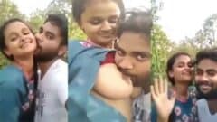 Beautiful Gf Feeding Milk to Bf in the Park